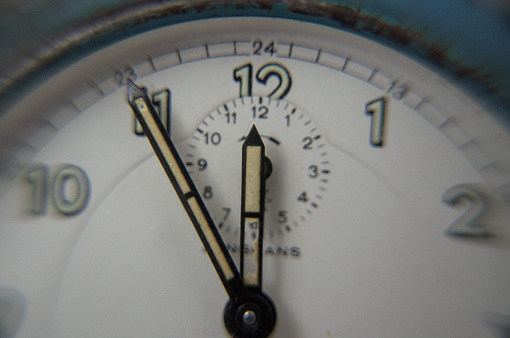 close up vintage alarm clock blue