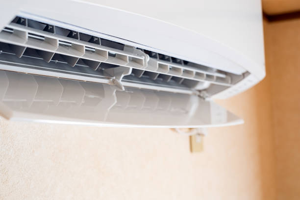 istock Air conditioner on a wall. Closeup image. 1251127023