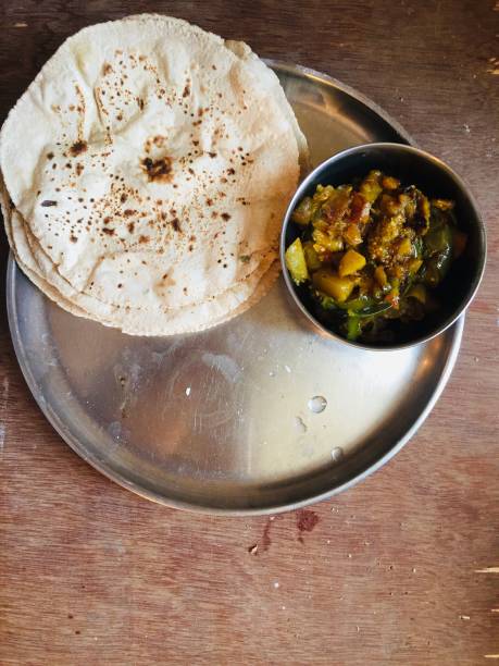 istock Wheat roti and sabji on plate 1251127127