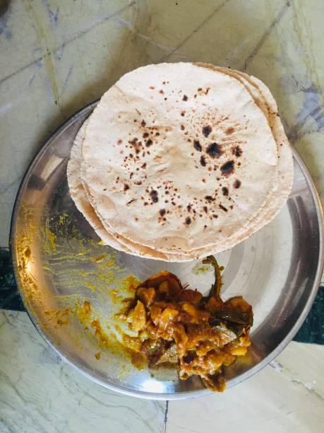 istock Roti or chapatis and sabji on plate 1251127710