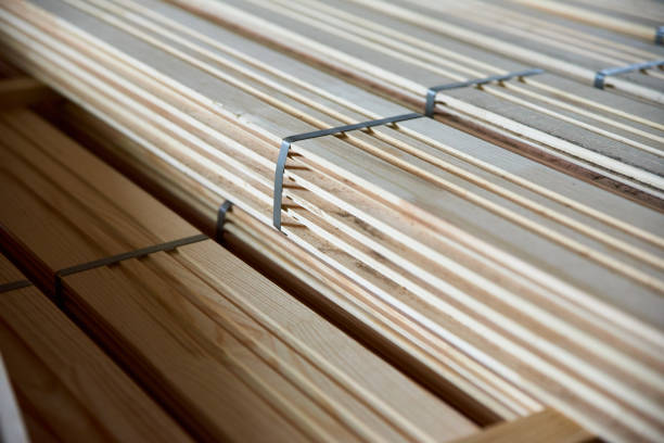 istock The facing wooden board is stored in a warehouse. 1251133488