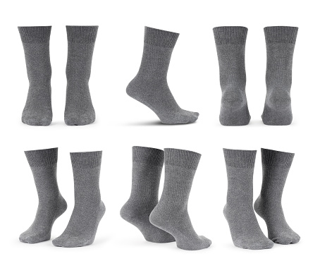 Conjunto de calcetines grises en blanco maqueta aislada sobre fondo blanco con trazado de recorte photo