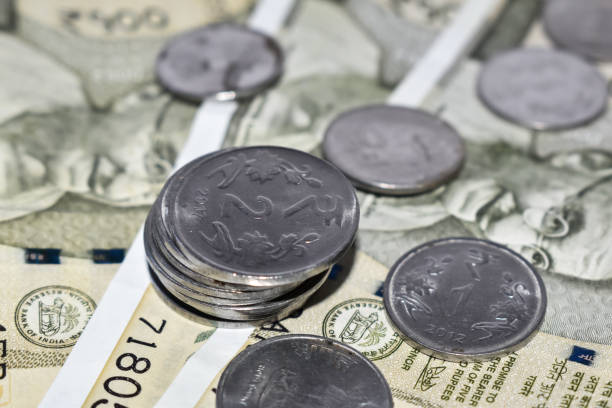 istock Pile of Indian 500 rupees Currency notes and coins. Selective focus applied. 1251133829