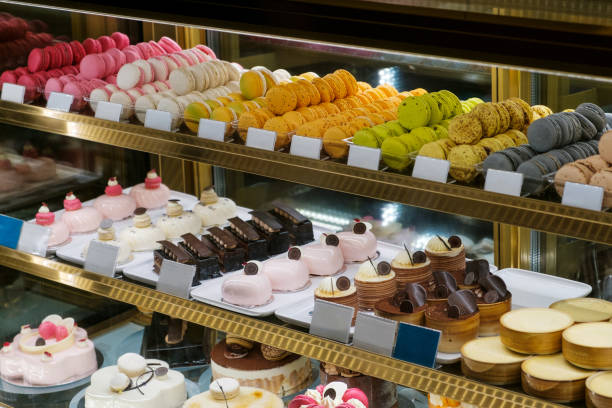 istock sweets and cakes on display in bakery shop - 1251134118