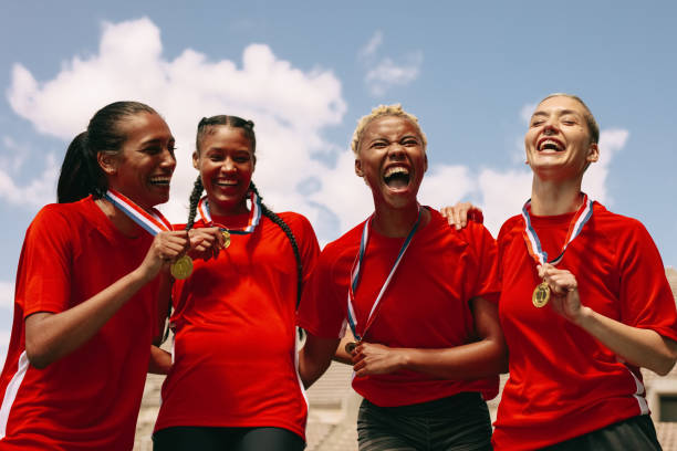 istock Female soccer championship winners 1251140530