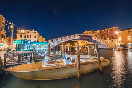 Nightshot, long time exposure , of the Narrow channels in Venice , Italy