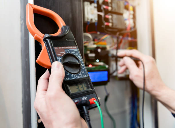 istock The man is repairing the switchboard voltage with automatic switches. 1251144545