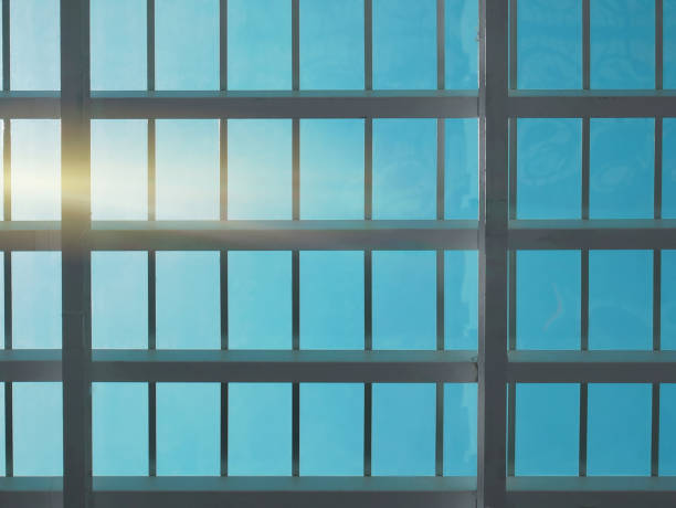 istock Full Frame Background of Modern Ceiling with Transparent Roof 1251144811