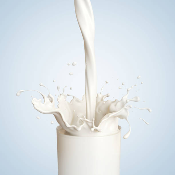 istock Milk Splash in the glass on white background. 1251145040