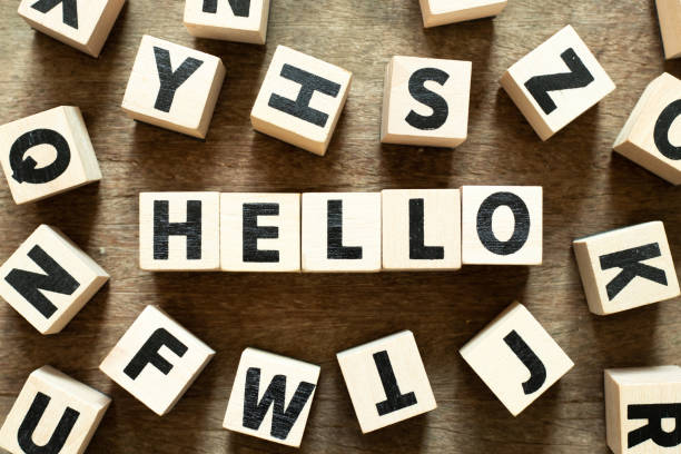 istock Letter block in word hello with another block on wood background 1251148344