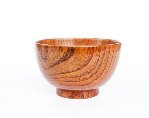 istock Wooden bowl on white background. 1251150335