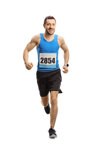 Full length portrait of a man running a marathon race isolated on white background