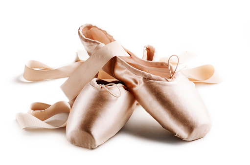 Pointe shoes isolated over white background