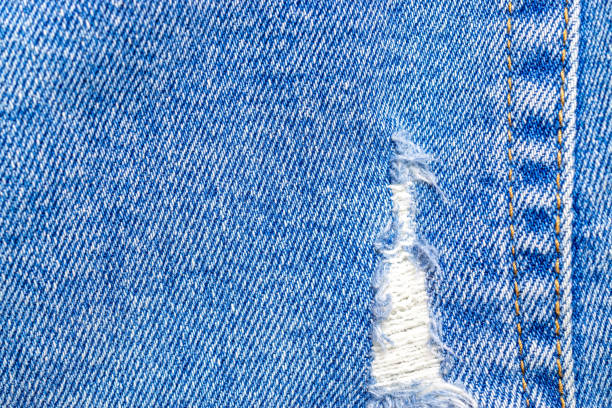 istock Denim design pattern. Blue jean texture with macro style to pres 1251156317