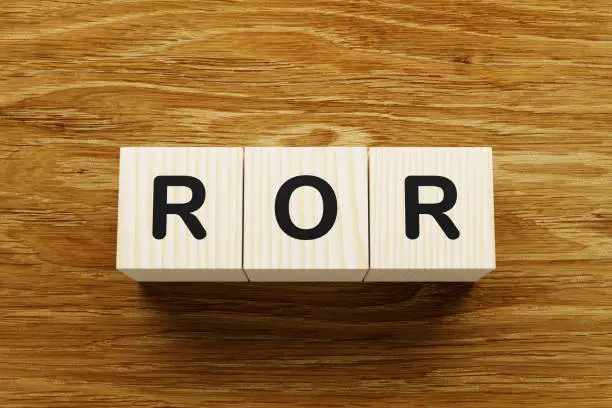 Photo of ROR word on wooden blocks.