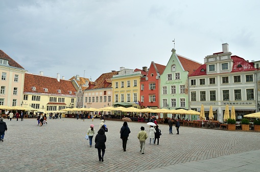 Tallin old town square with what seems like a boatload of tourist because it is a boatload from a cruise tour of the Baltic region of northern europe