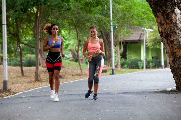 istock woman excercise and running in park 1251162080
