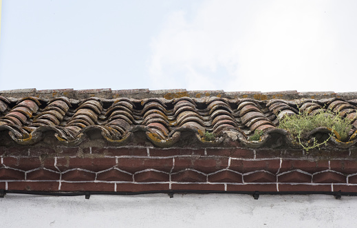 Eaves of village roofs built with red clay tile natural daylight