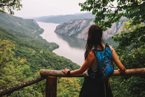 Woman overlooking the Iron Gates gorge on the river Danube.