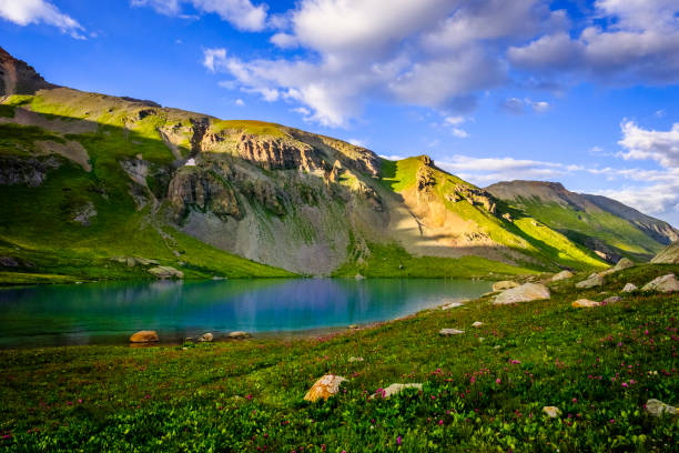 istock Scenic view of high alpine lake in spring 1251177127