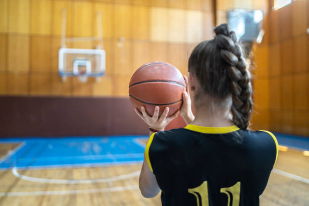 istock Practicing free throw in basketball game 1251178428