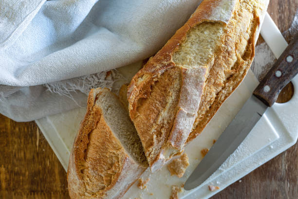 istock A fresh and crispy Italian bread on the table. 1251179681