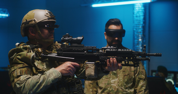 Medium shot of soldiers testing VR technology