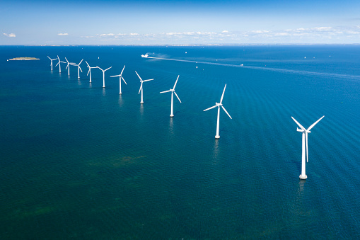 Unique aerial of the Offshore-Windpark (OWP) five kilometers off the coast of Copenhagen, Denmark. Converted from RAW.
