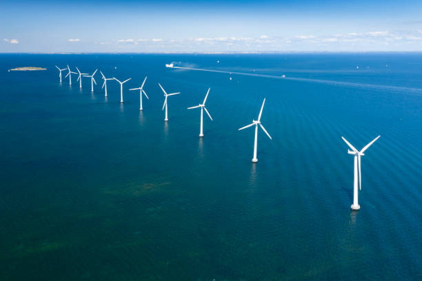 Offshore Wind Farm, Copenhagen, Denmark Unique aerial of the Offshore-Windpark (OWP) five kilometers off the coast of Copenhagen, Denmark. Converted from RAW. offshore wind farm stock pictures, royalty-free photos & images