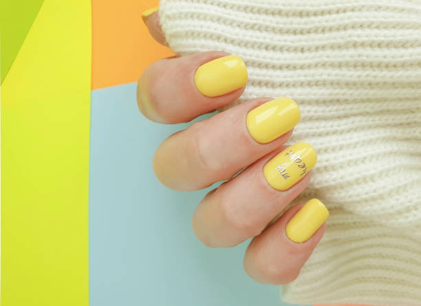 istock female hand nail beautiful manicure sweater 1251183998