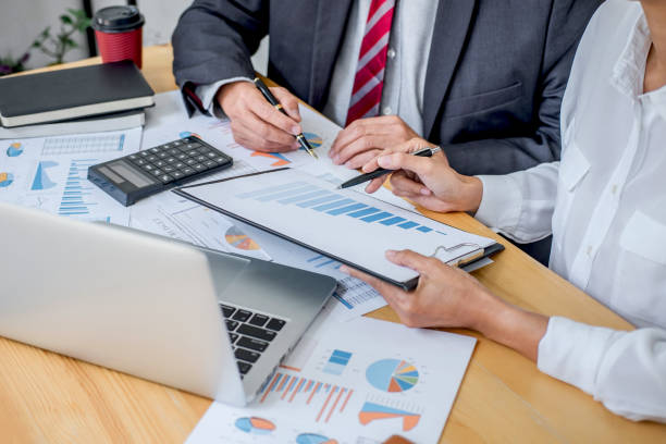 istock Business team consultant working with new startup growth project plan and discussion analyzing for financial strategy statistics with computer, results of collaboration their successful teamwork 1251185132