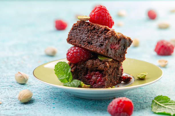 istock Traditional brownies with raspberries. 1251185289