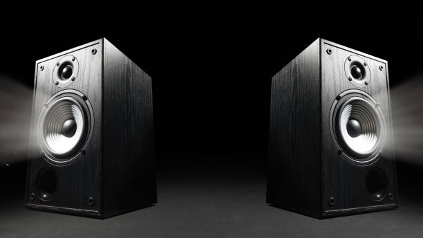 istock Two sound speakers on black 1251185473