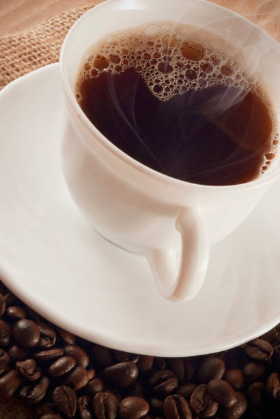 istock Cup of coffee with coffee beans 1251187032