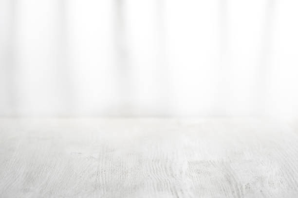 istock Background white painted boards on white background in blur. Photo with copy space. 1251189474