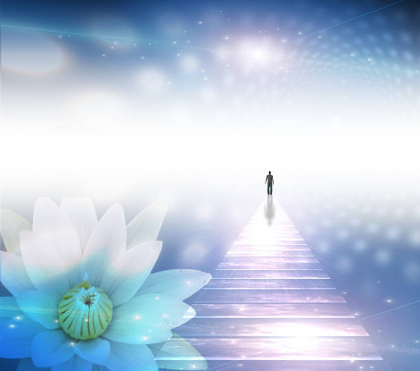 Towards the light Figure of a man on shining road. White lotus. Towards the light afterlife stock pictures, royalty-free photos & images