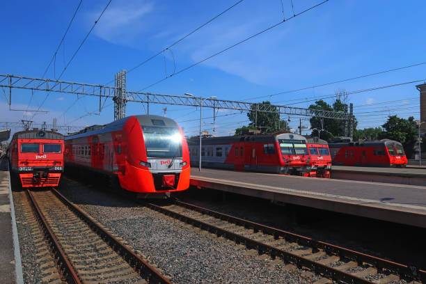 electric trains waiting for passengers on the platform June 18, 2020, Russia, St. Petersburg, suburban electric trains at the station platforms commuter train photos stock pictures, royalty-free photos & images