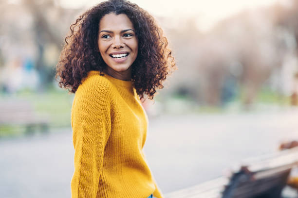 istock Beautiful smiling African ethnicity girl 1251197706