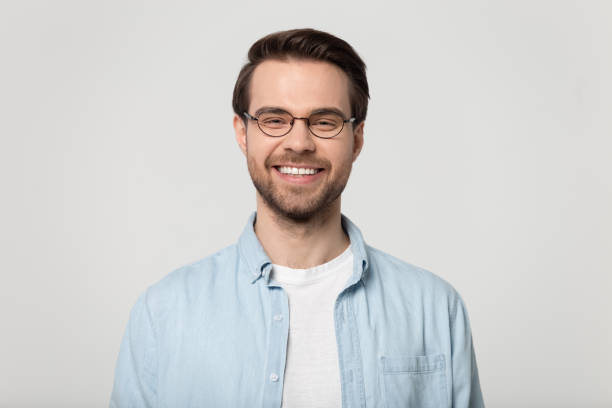 istock Happy Caucasian man in glasses isolated on studio background 1251198956