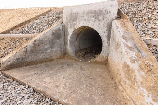 Installation of culvert drainage pipe and ditch structures under the highway
