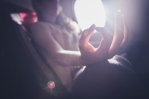 Meditation in airplane.