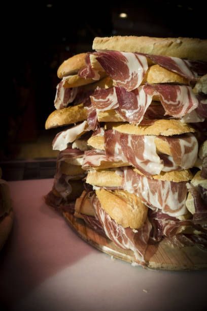 istock Serrano ham sandwiches stacked. No people 1251203081