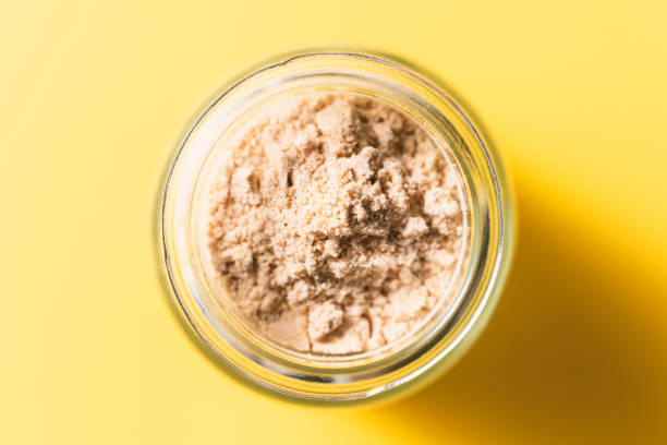 istock Powdered ginger in glass jar 1251203237