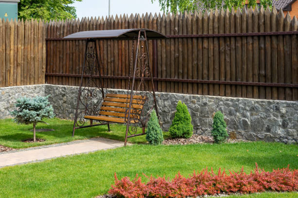 istock Swing under cover in the yard. A cozy corner 1251203521