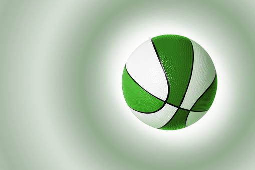 Green - white basketball on a color gradient background. Space for copy.