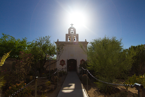Tucson, Arizona, USA - May 3, 2019: Exterior of the San Xavier Mission in Tucson. The mission is the oldest remaining European structure in Arizona. The Franciscan Catholic Mission was completed in 1791 and remains open for worship and services today.