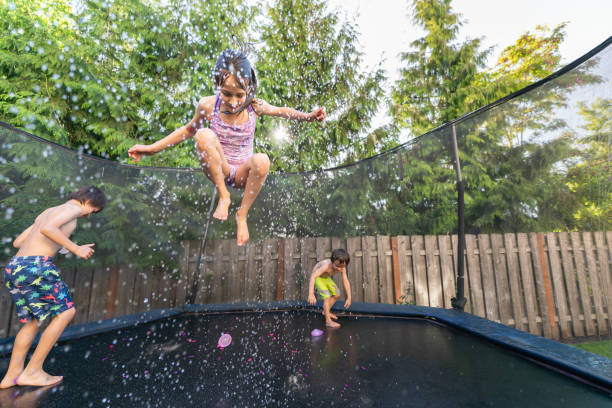 istock Mixed Race Siblings Playing Outside On A Warm Summer Day 1251219160