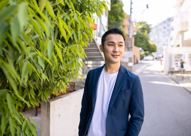 istock Young entrepreneur standing on street 1251219237