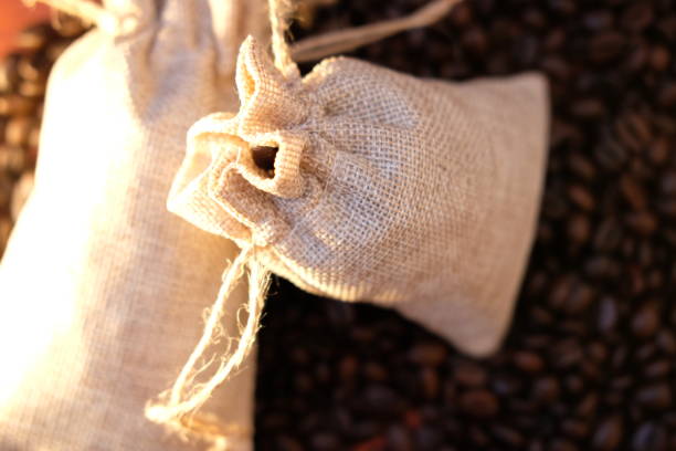 istock Coffee beans on wooden background and space for text 1251222218