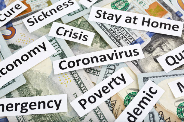 istock Coronavirus, COVID-19 headline clippings on 100 USD banknotes 1251231265